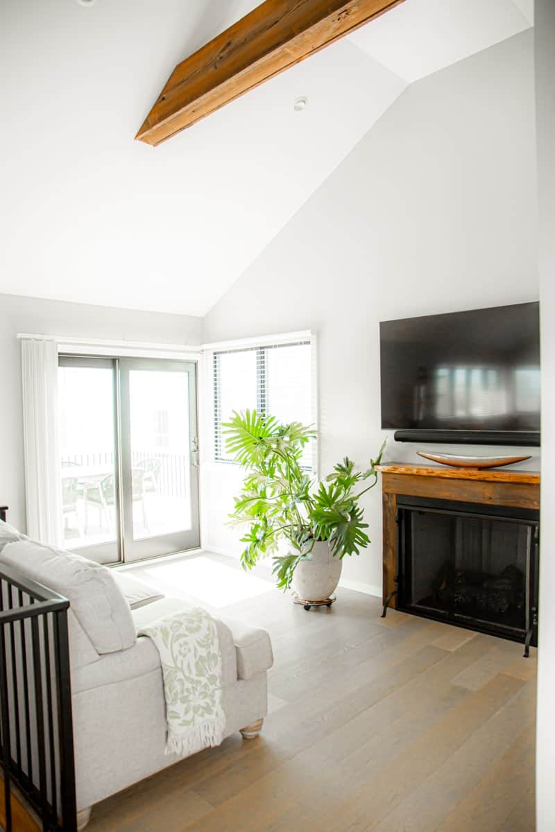 Fireplace and tv with outdoor access to a beautiful deck