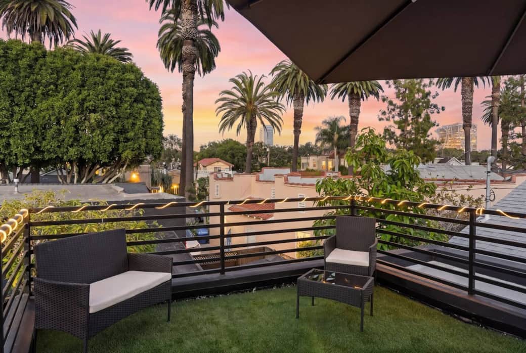 Includes an extra seating area with umbrella shade, to enjoy the palm views, and evening ambian Includes an extra seating area with umbrella shade, to enjoy the palm views, and evening ambian