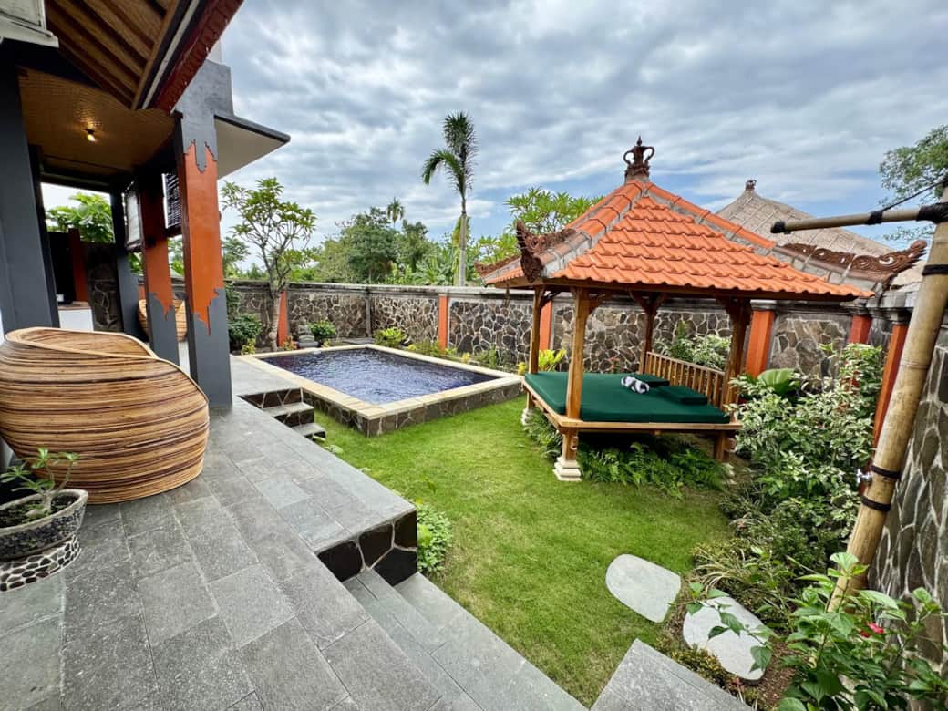 Private pool and gardens featuring a meditation/ yoga gazebo