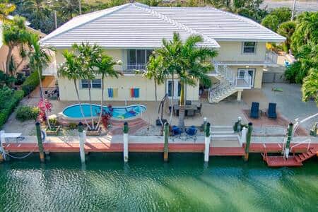 Spacious canal-front home with pool and 150' bulkhead, 80' of dock available 