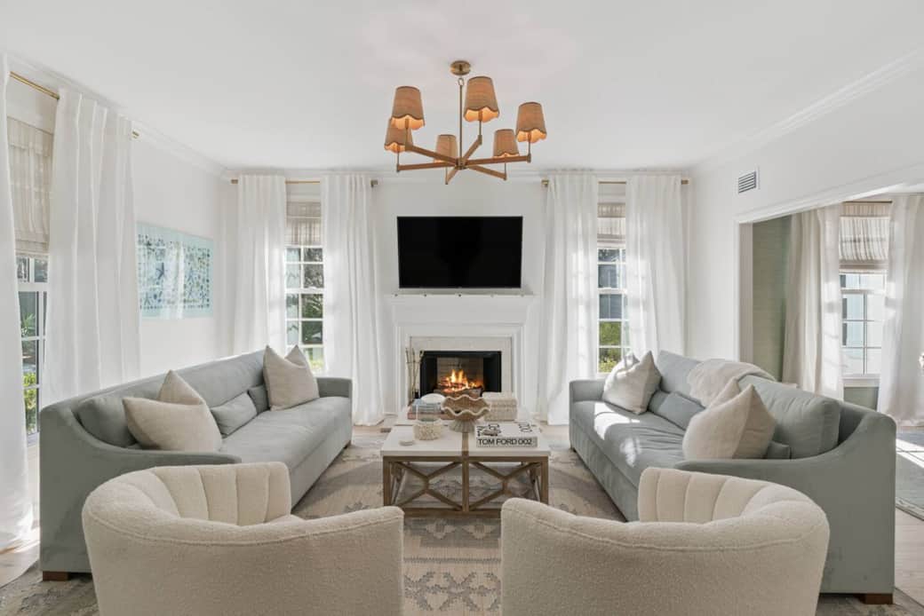 The Living Room is to the left when entering the home and off of the main hallway. 