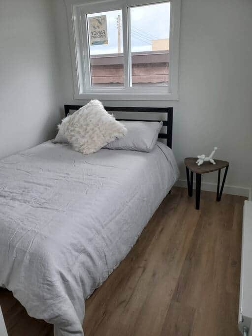 Private Bedroom with night stand and barn door Private Bedroom with night stand and barn door