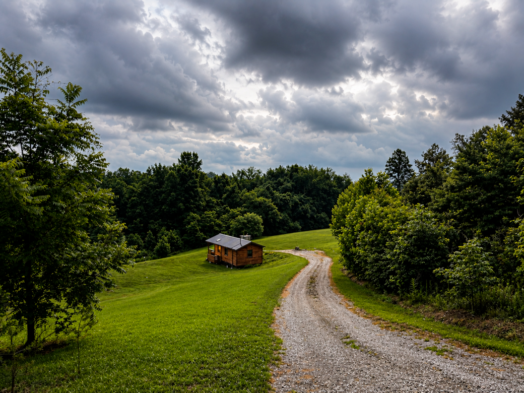 Private gravel drive leading in to the property