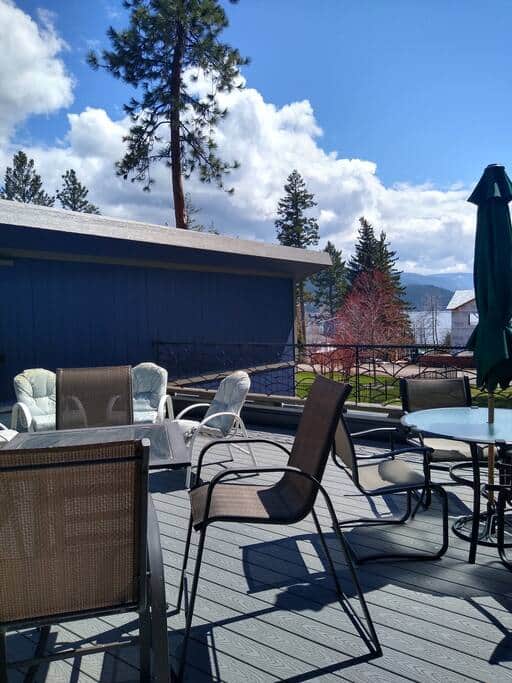 Recently added deck with Flathead Lake and mountains in the distance. Recently added deck with Flathead Lake and mountains in the distance.
