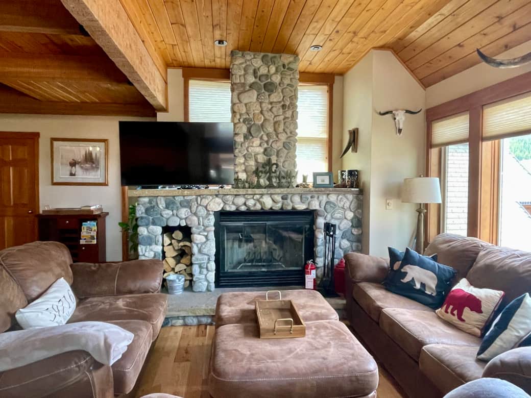 Living room with wood burning fireplace