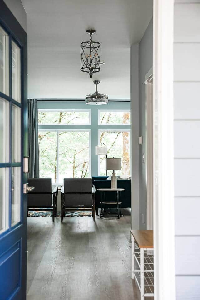 Main Entrance to a stylish living room with abundant natural light creates the perfect escape!