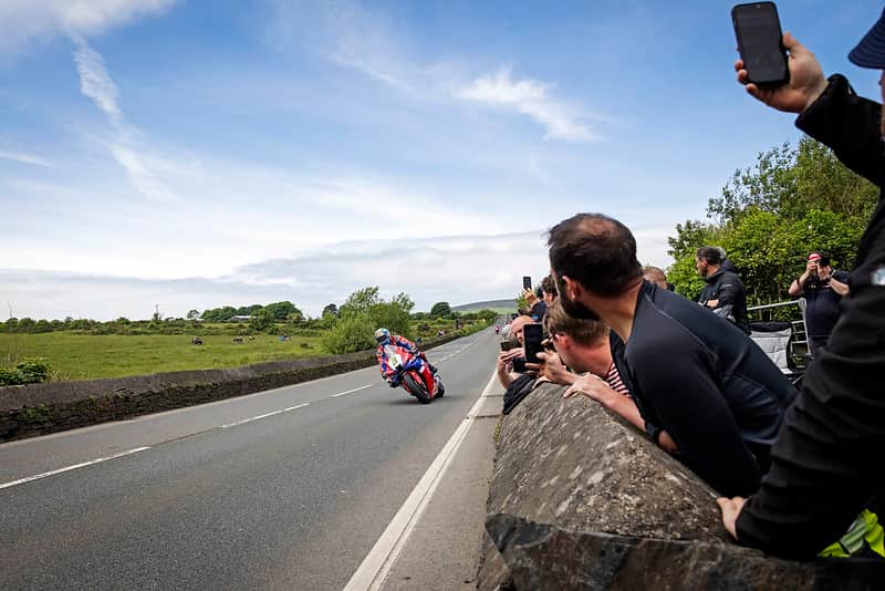 Spectators watching motorcycle races during IOM TT (Credit Visit Isle of Man)