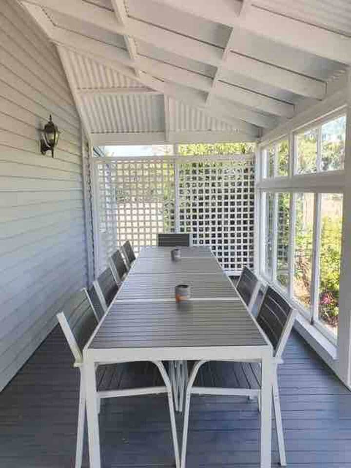 The enclosed verandah offers additional space for dining and lounging (outdoor loungers not shown) 