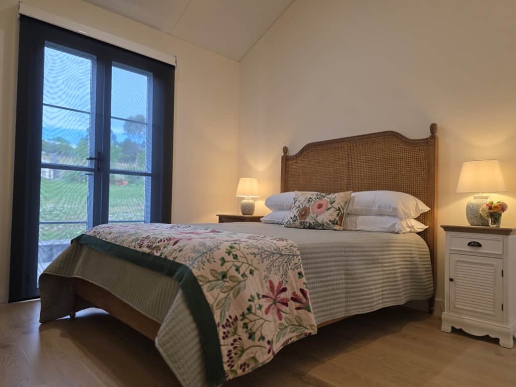 Main bedroom, queen size bed with comfy pillow topper, french doors to back deck. Main bedroom, queen size bed with comfy pillow topper, french doors to back deck.