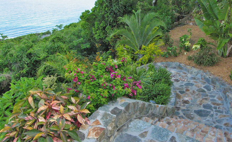 Walkway gardens lead to The Cottage