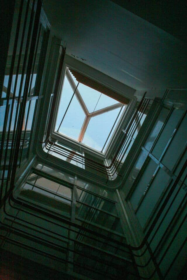 View from below of the interior of Caleta Club here in el Casco Antiguo de Cadiz. There is a rooftop shade that can be opened or closed to control temperature and light. 