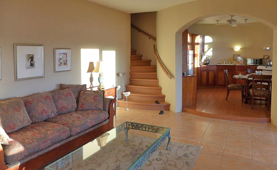 Villa Interior with stairs to private bath and shower
