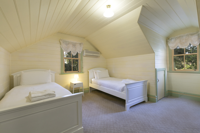 Loft above garage has 4 single beds