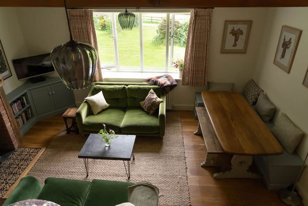 The open plan sitting and dining room area The open plan sitting and dining room area