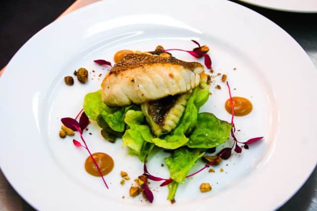 Fish dish with greens served at Am Birlinn restaurant on Mull