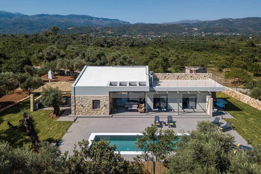 Villa from above, surrounded by the lush area of the valley