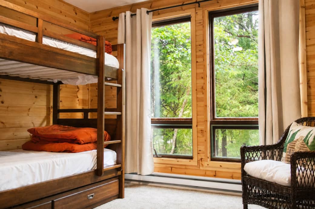 Bedroom with forest views