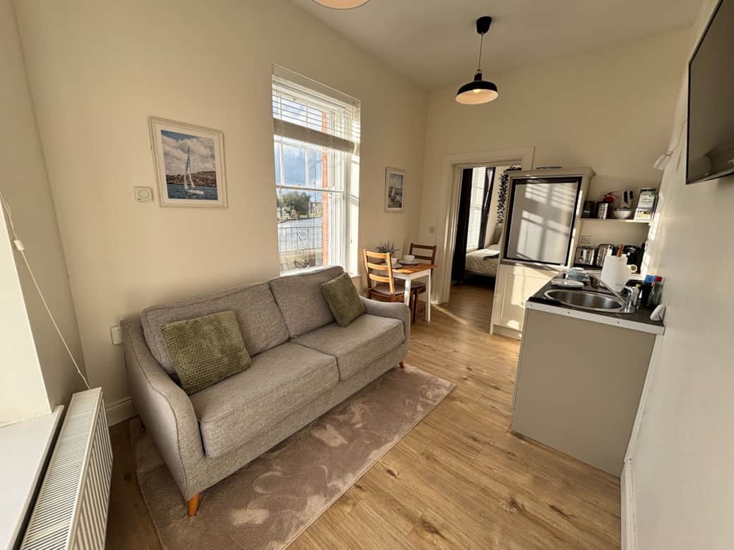 Bright and cozy living and kitchen area Bright and cozy living and kitchen area