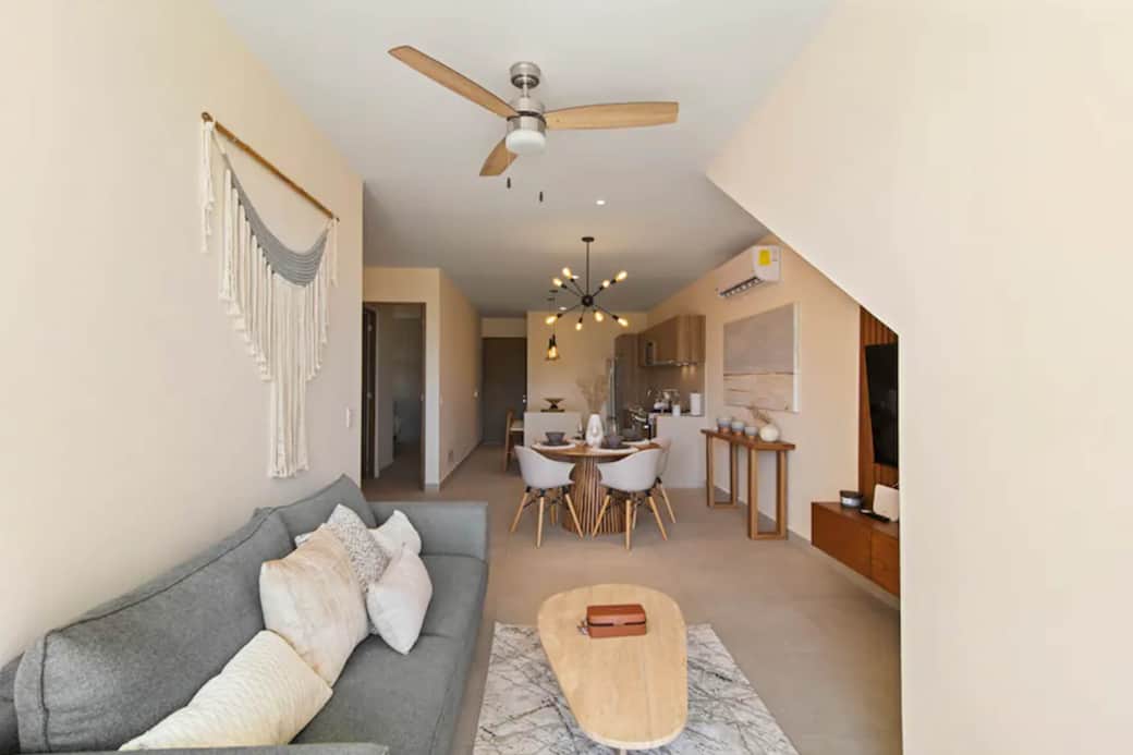 Cozy living room: Generous couch for guests or movie nights.