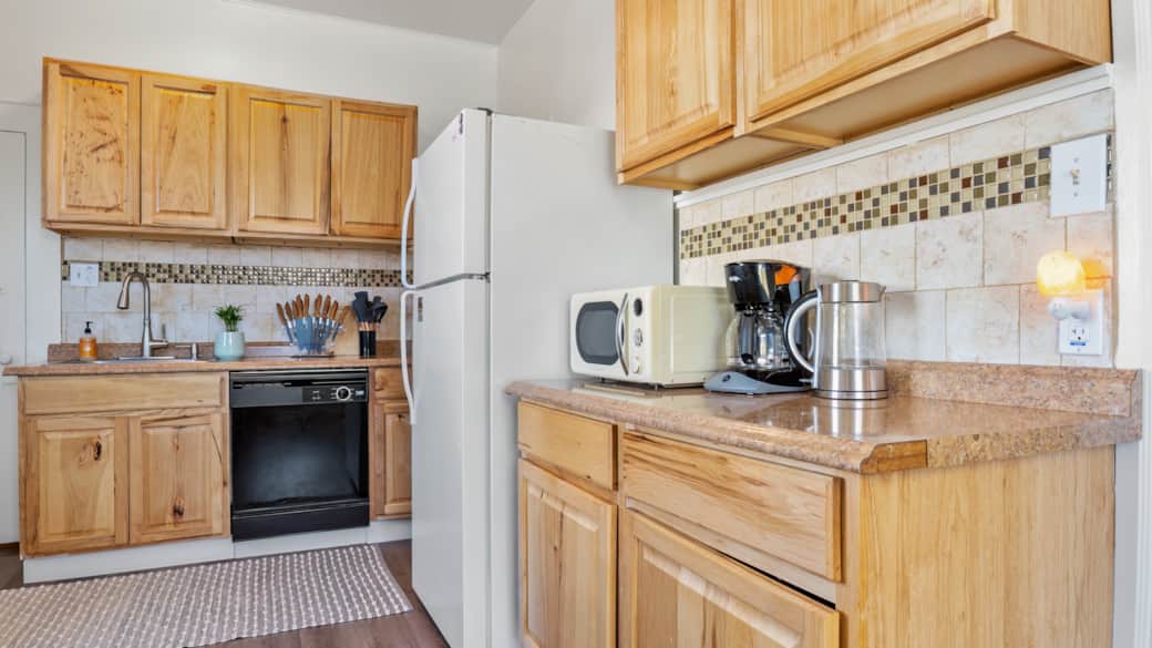 Plenty of Cupboards and Drawers, Coffee Maker, Microwave, and Water Pitcher Plenty of Cupboards and Drawers, Coffee Maker, Microwave, and Water Pitcher