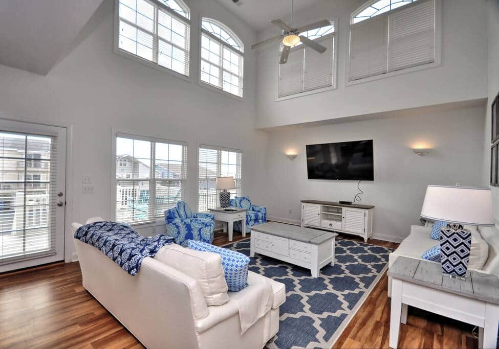 Main living area with a new 70-inch smart TV.