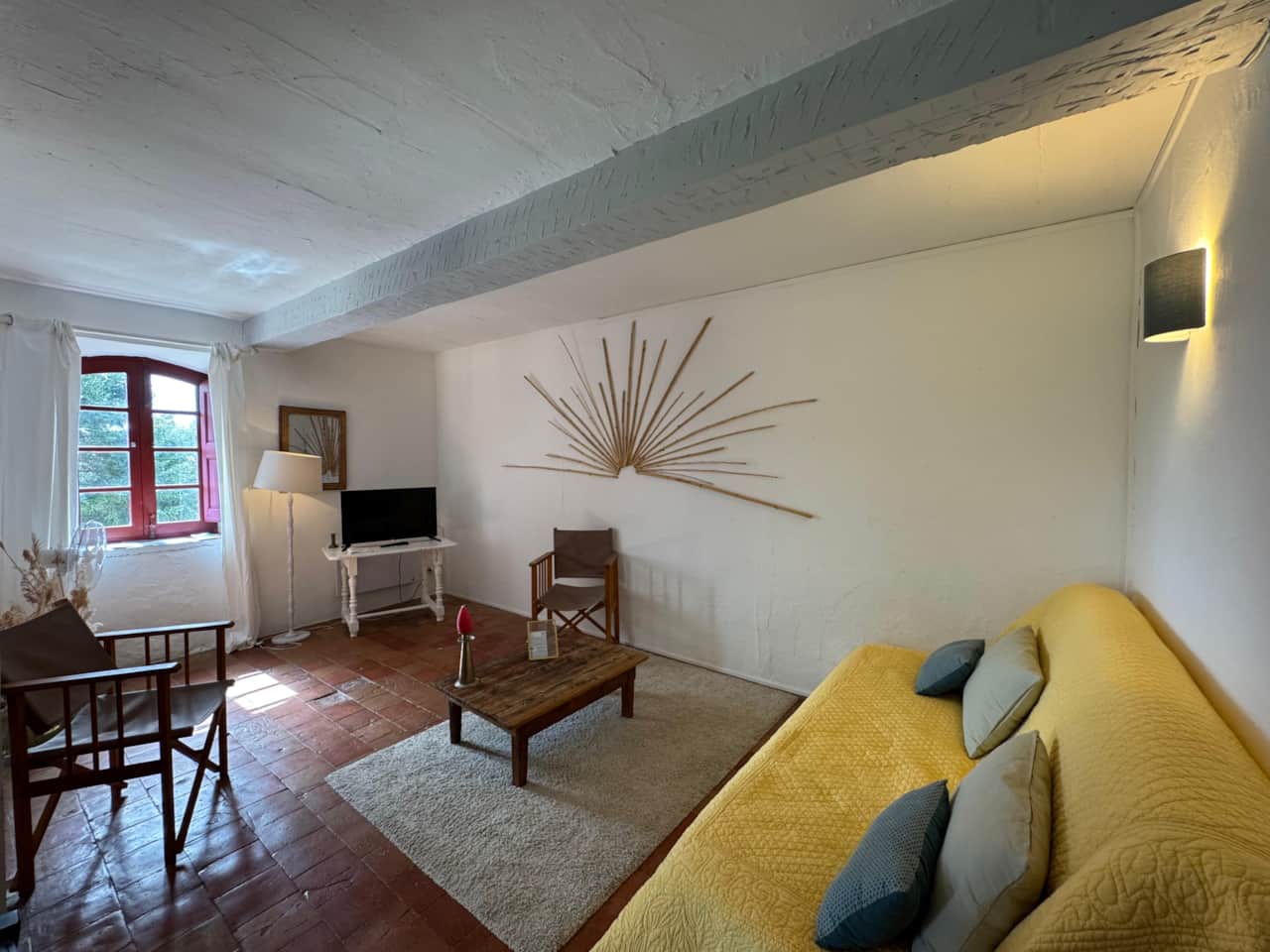 living room, convertible sofa, chair, TV