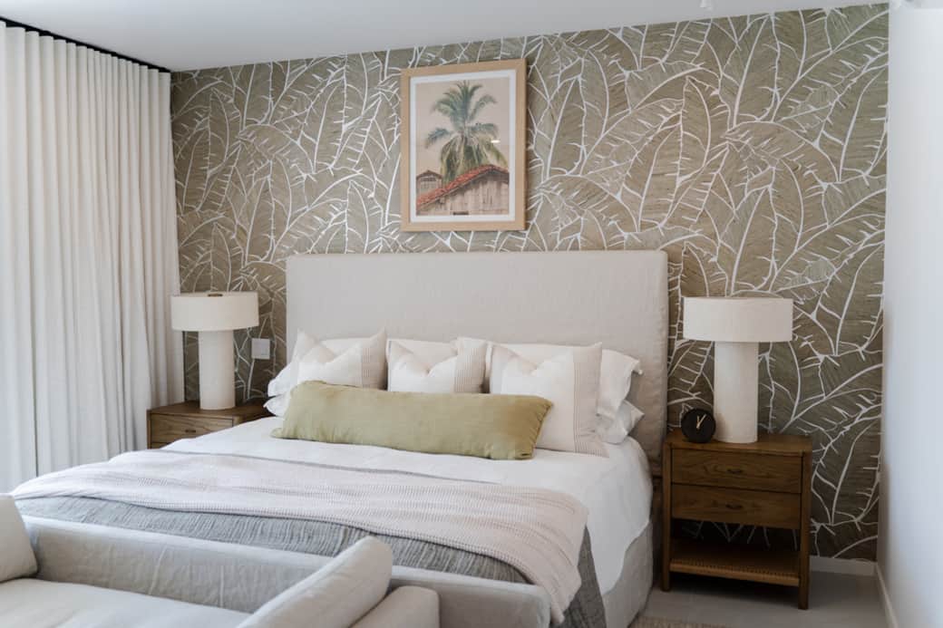 Spacious master suite with king bed, ensuite, and private balcony views.