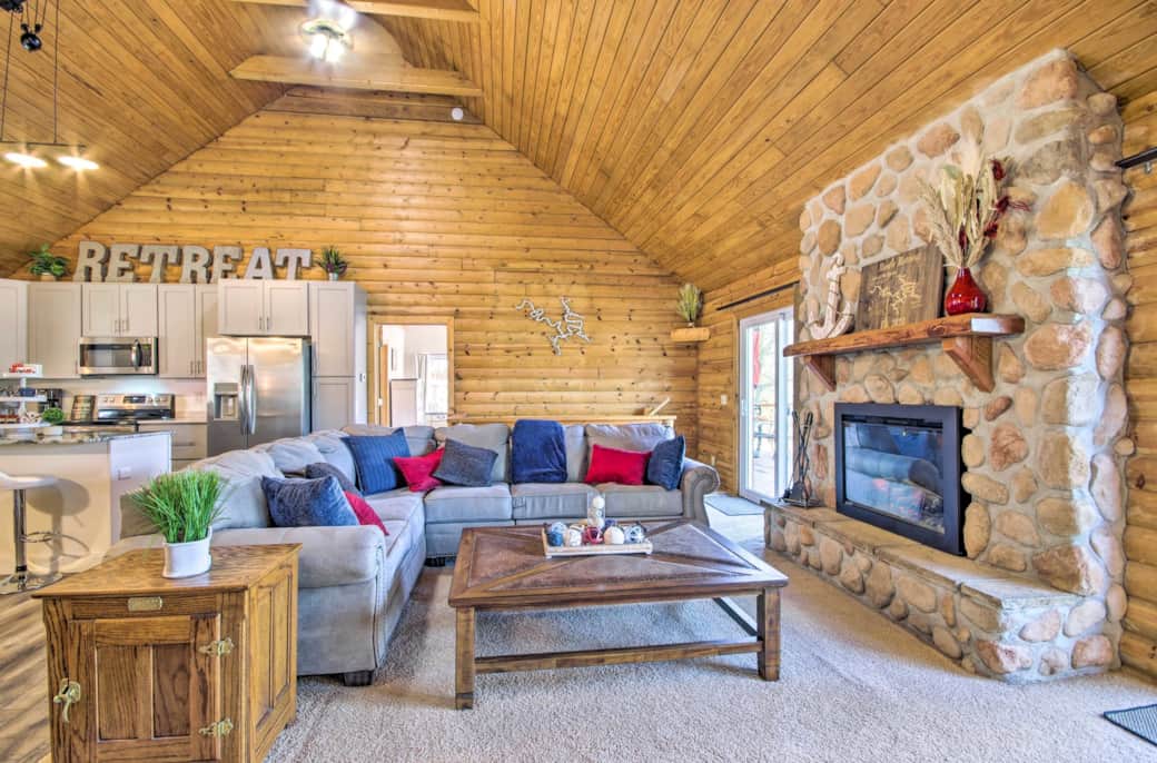 Snuggle up on couch as you enjoy the electric fireplace.