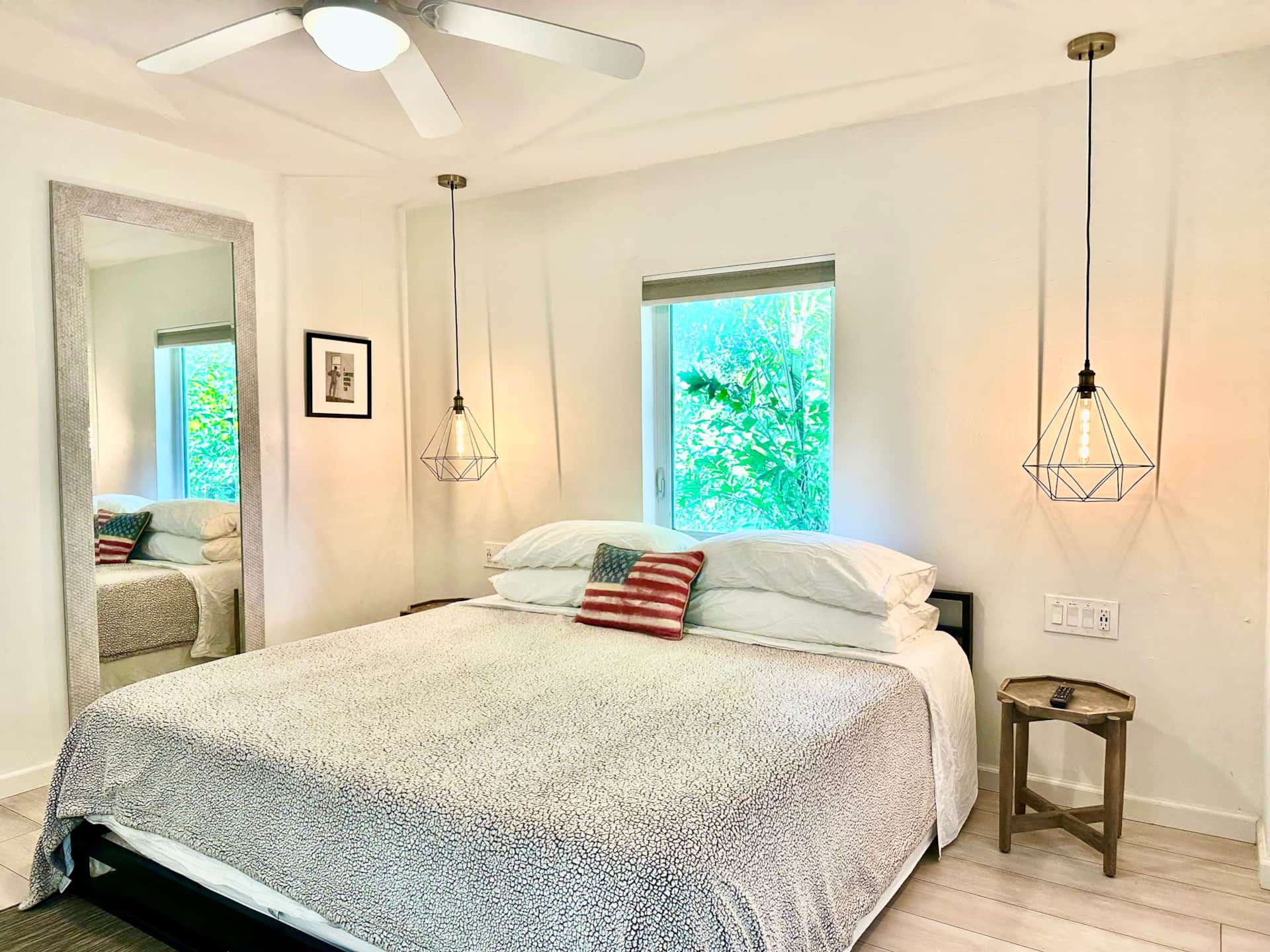 Light-filled renovated bedroom in Unit 2 at Casa Citron with central AC, expanded closet space, and a clean, modern interior.