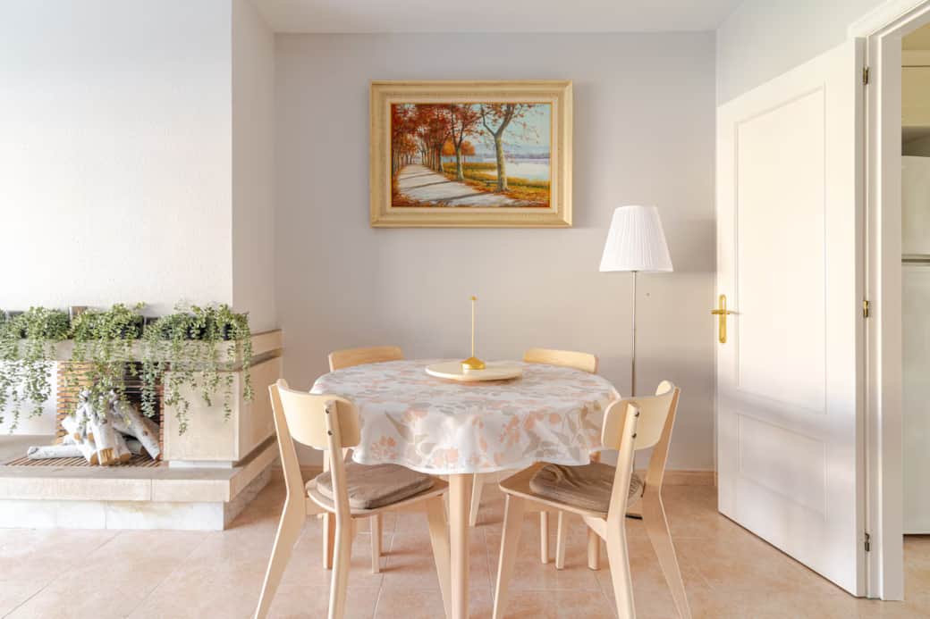 Dining table for 8 guests. Welcome box with drinks, snacks, and pastries