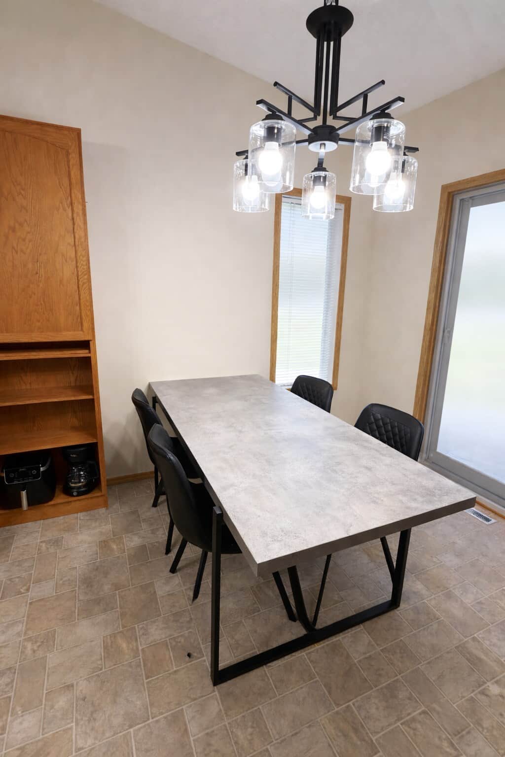 Large dining table perfect for family meals at Whisper Creek