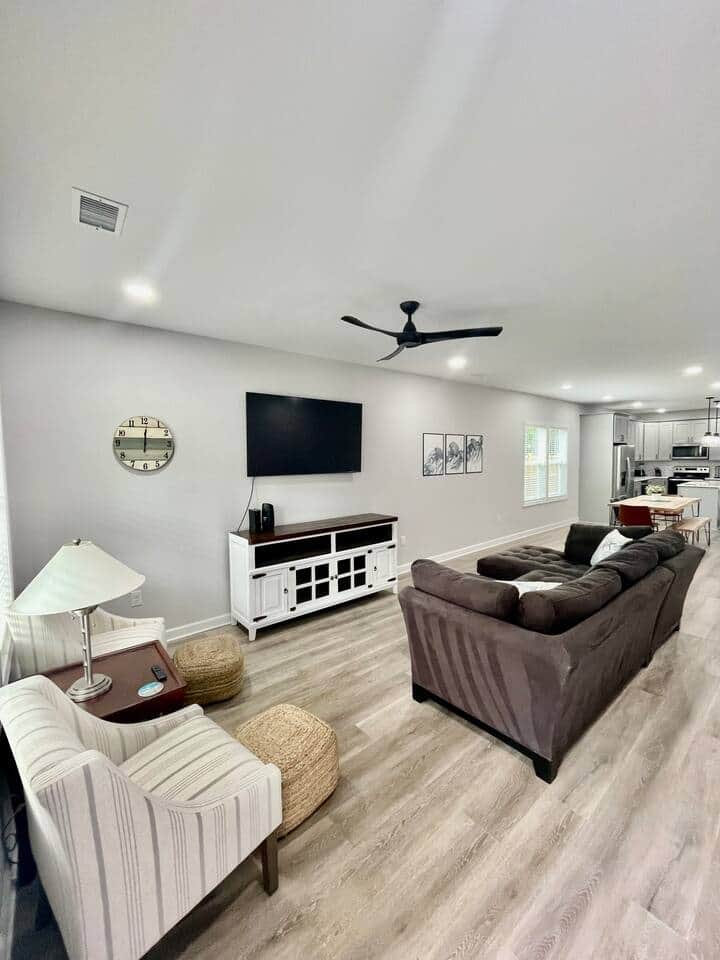 Spacious living room with 65 inch smart tv