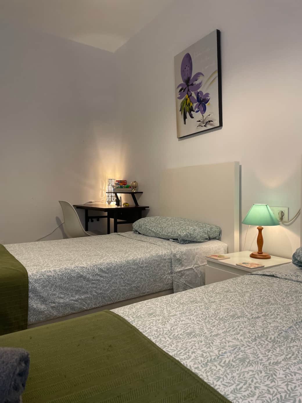 Small bedroom single beds and office table