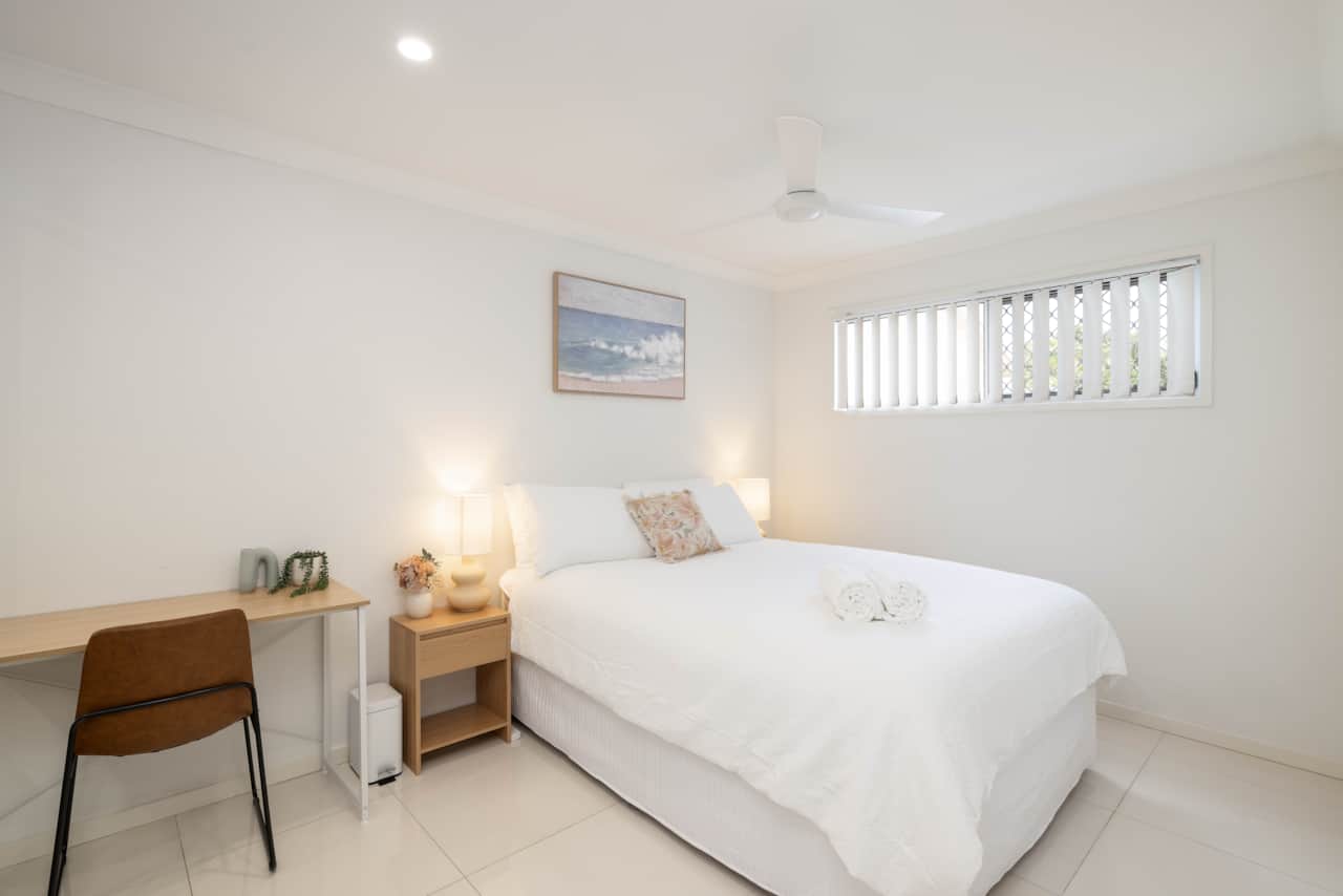 Bedroom: Peaceful bedroom with cozy design and ample storage 
