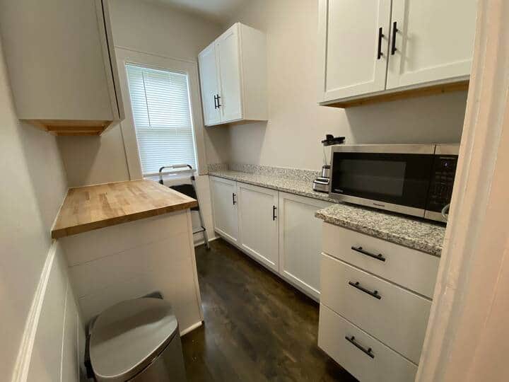 Clean and open kitchen area with modern finishes and natural light.