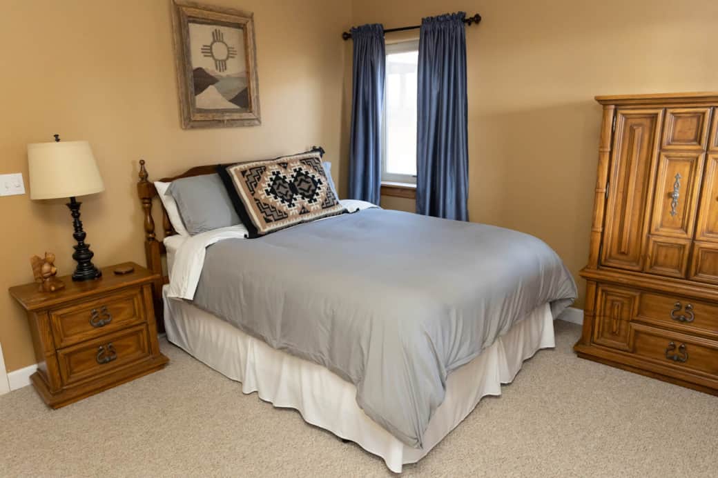Bedroom 4 has a queen sized bed.