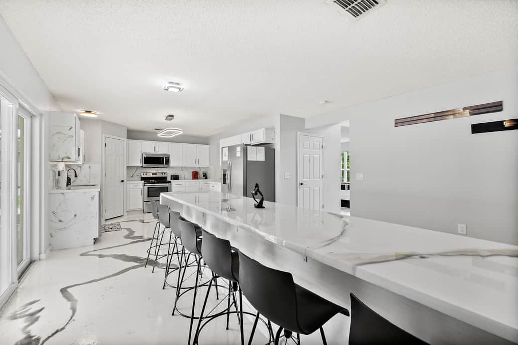 Discover the heart of the home in our modern kitchen, where epoxy designs blend style and functional