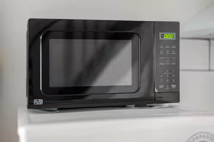 microwave and dining and essentials, convenient for longer stays.