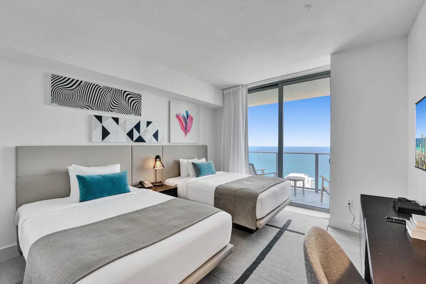 2nd bedroom with two queen beds and ocean view