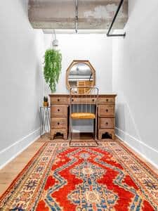 Large closet in the loft bedroom with a vintage restored vanity