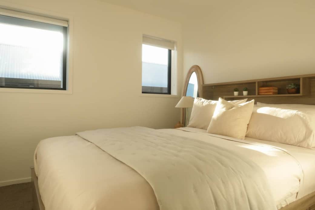 Comfortable queen size bed with medium firm mattress