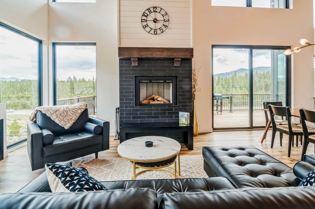 Great room with 19 ft cedar ceilings and wood fireplace.  Incredible views!