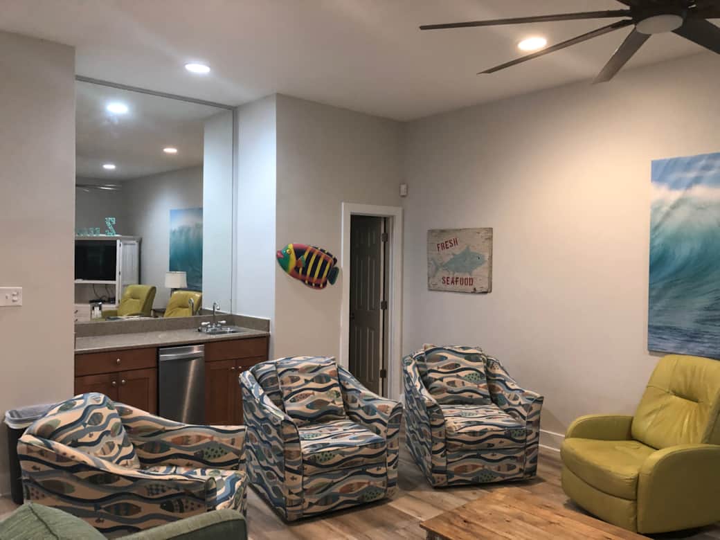 Enjoy a tropical drink. The wet bar is next to the living room and dining room. Enjoy a tropical drink. The wet bar is next to the living room and dining room.