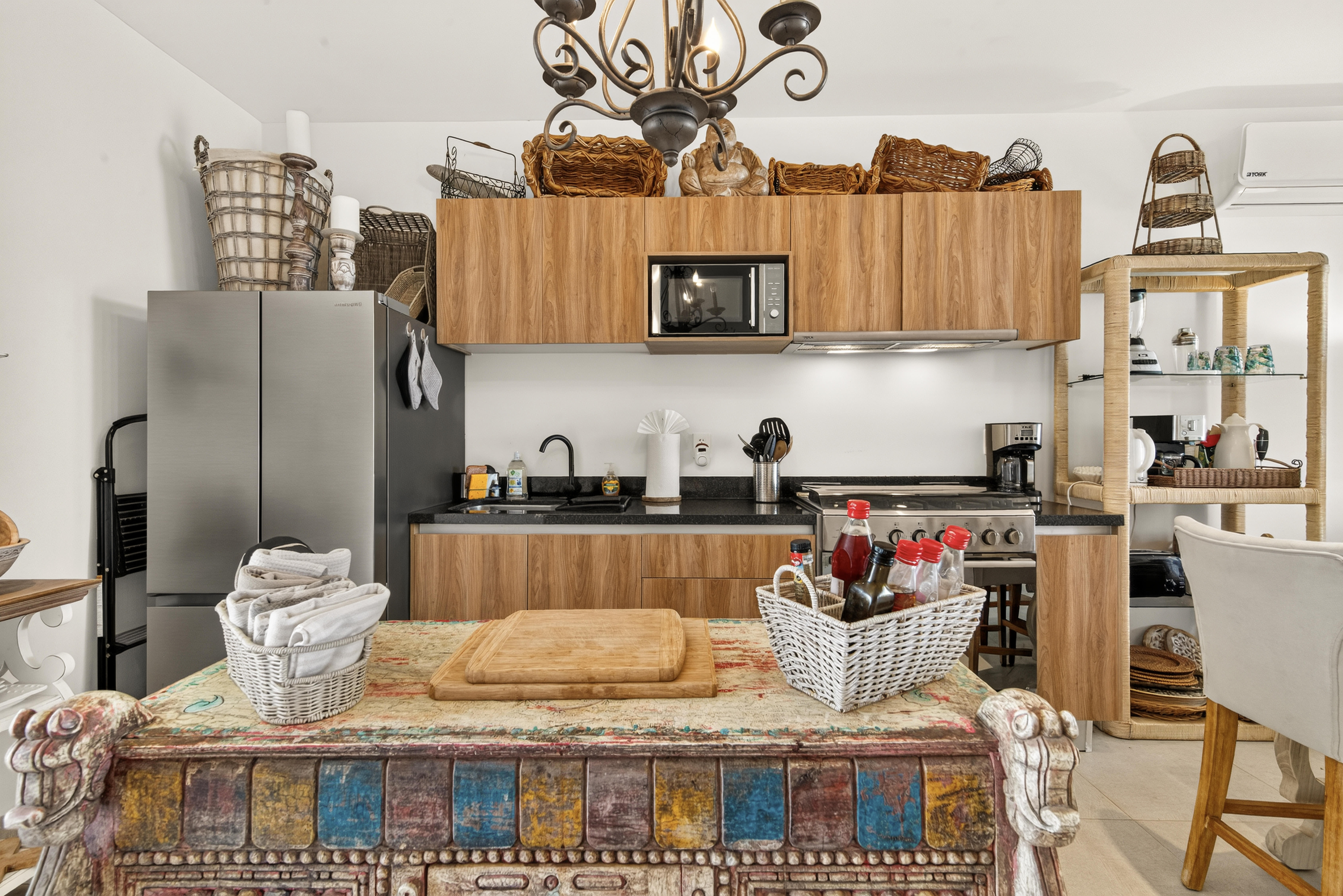 Fully equipped kitchen with modern appliances, ample counter space, and everything you need to cook.