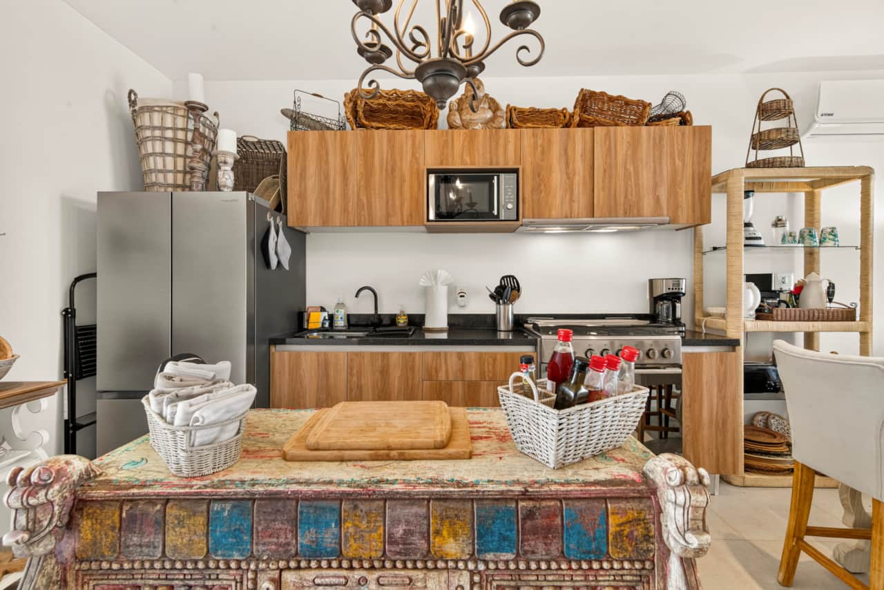 Fully equipped kitchen with modern appliances, ample counter space, and everything you need to cook.