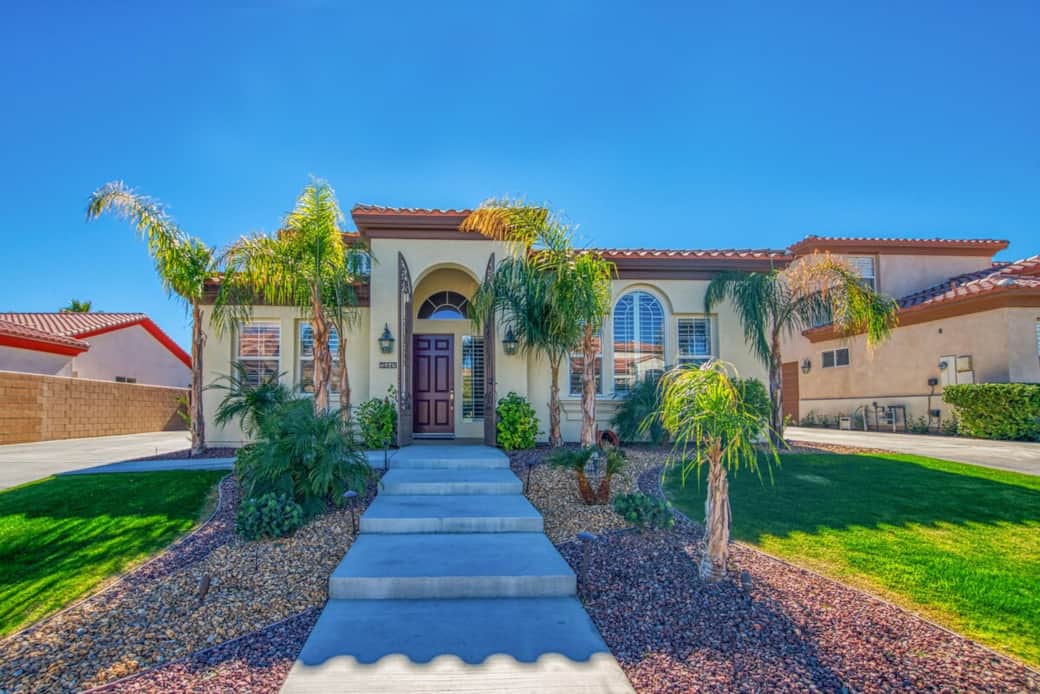 A beautifully landscaped stairway leads you to the front door. A beautifully landscaped stairway leads you to the front door.