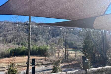 Wake up to the fresh mountain air and views of the pond and horses.