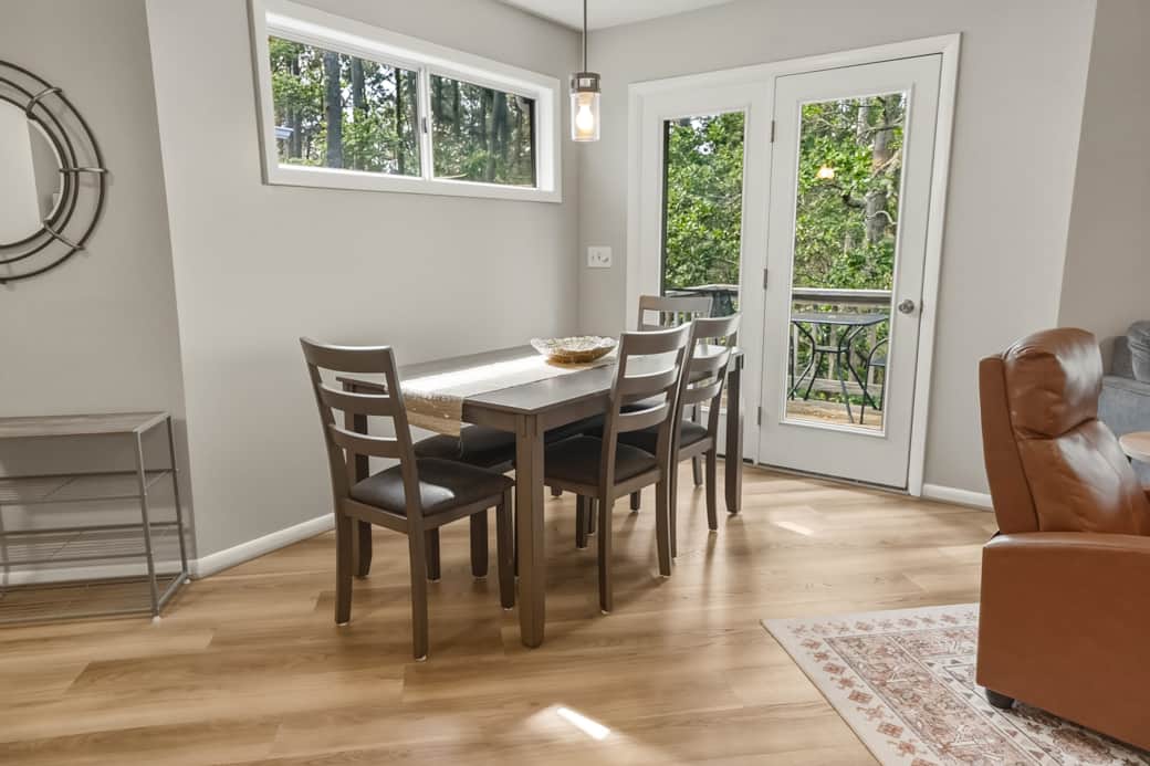Dining table for 6 and access to private back deck