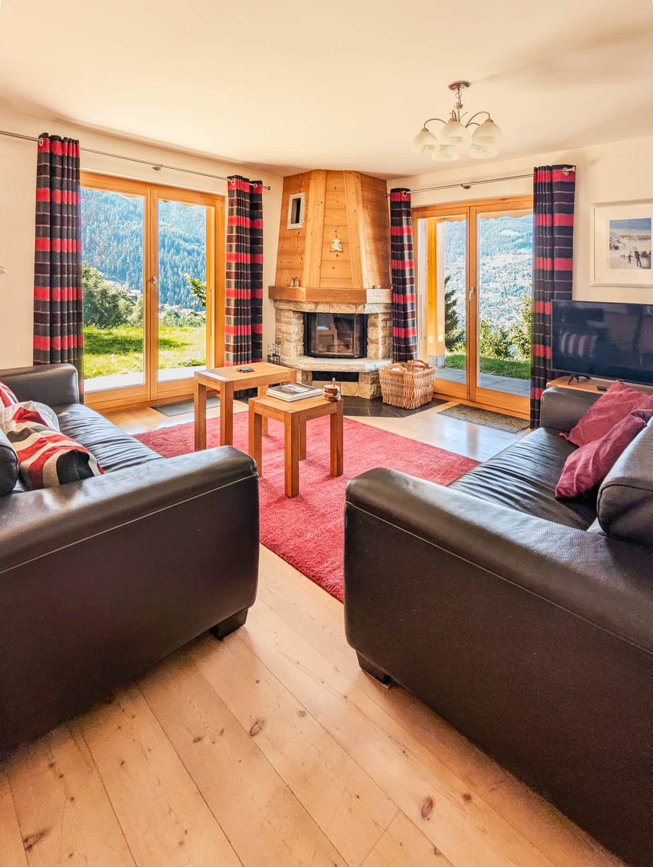 Living room with fireplace, leather sofa