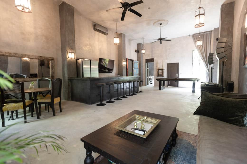 The unique "Dojo" space is equipped with a full-sized bar, billiards, and Sonos